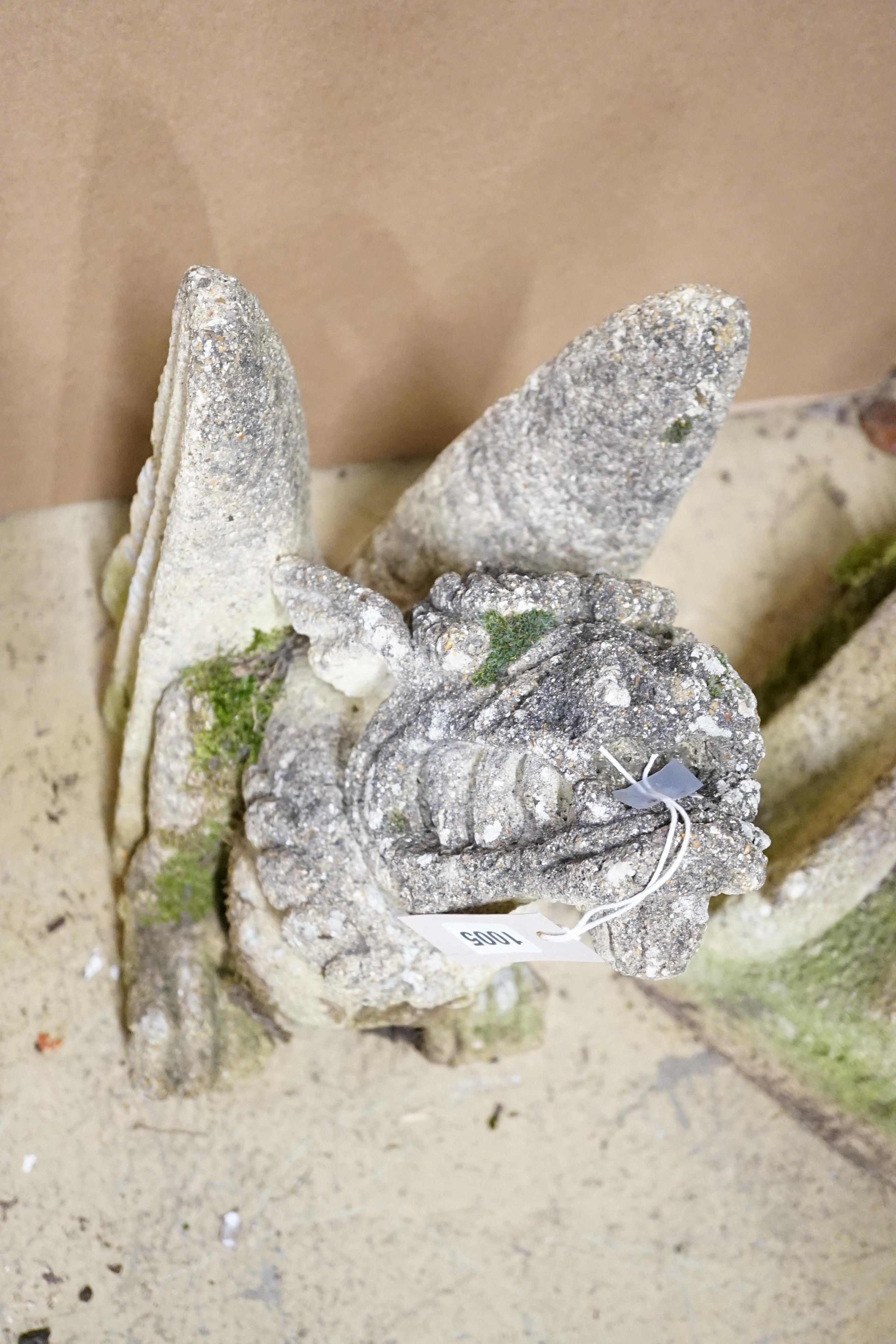 A reconstituted stone dragon gargoyle, 43cm and another similar carving